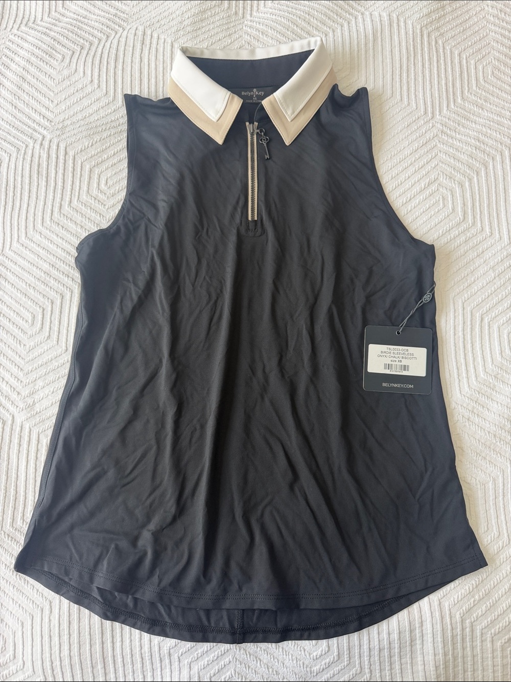 Belyn Key Black Sleeveless Zip Polo with White and Tan Trim